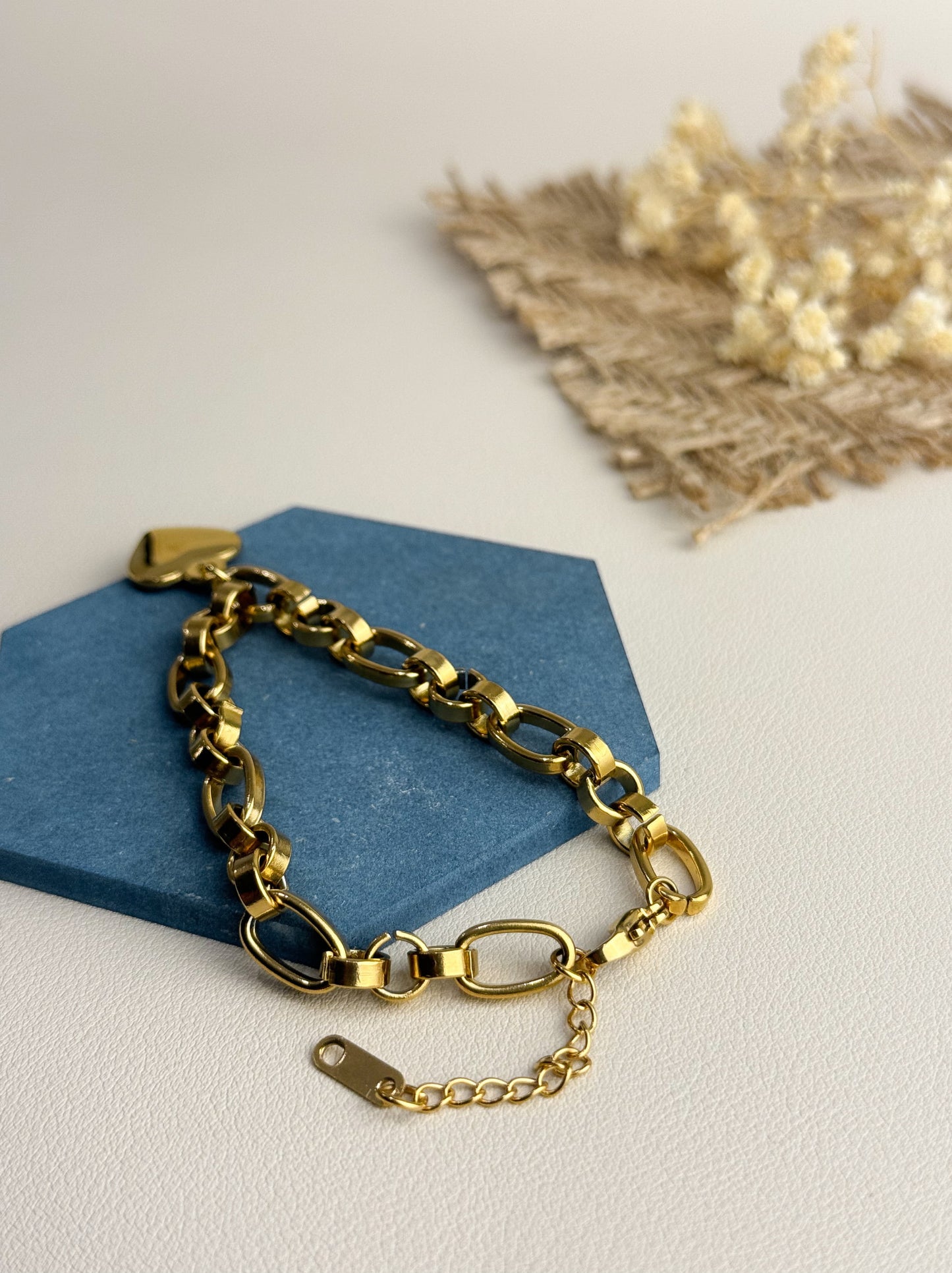 Golden steel chain bracelet with heart