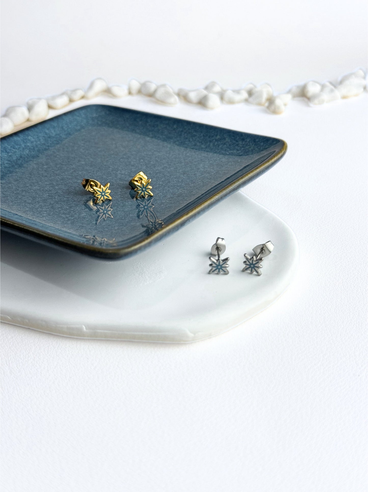 Golden steel earrings