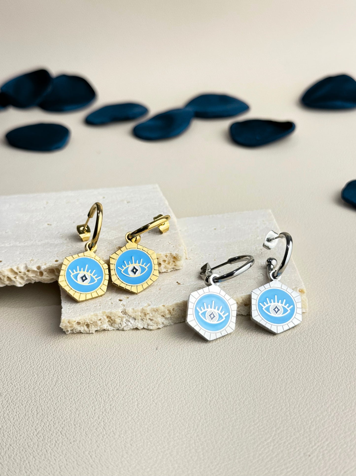 Créoles en acier argenté œil bleu