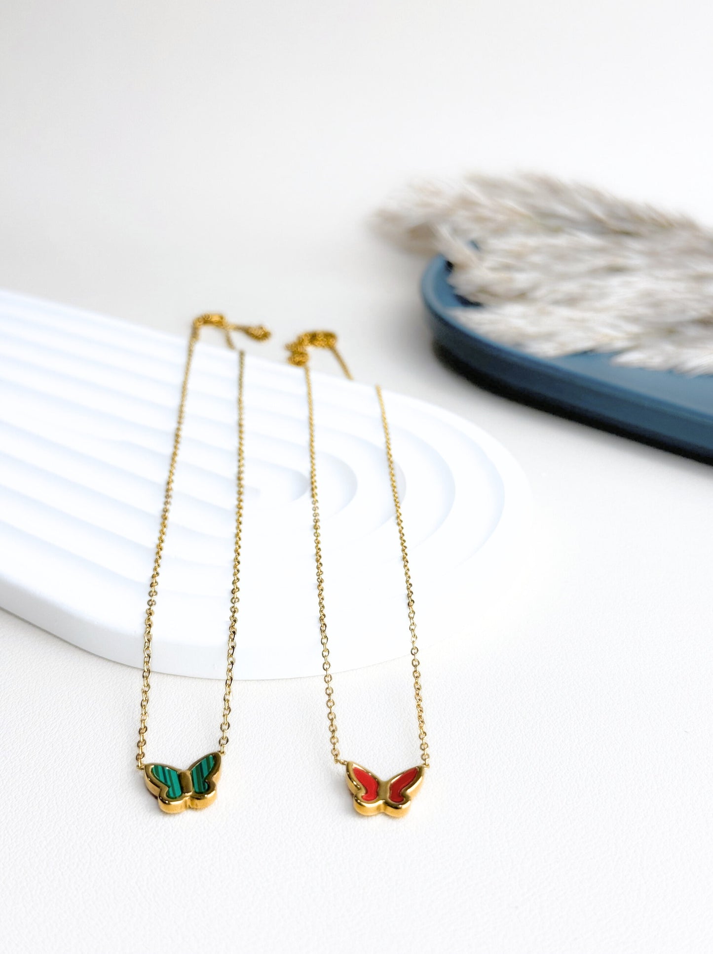 Red butterfly gold steel necklace