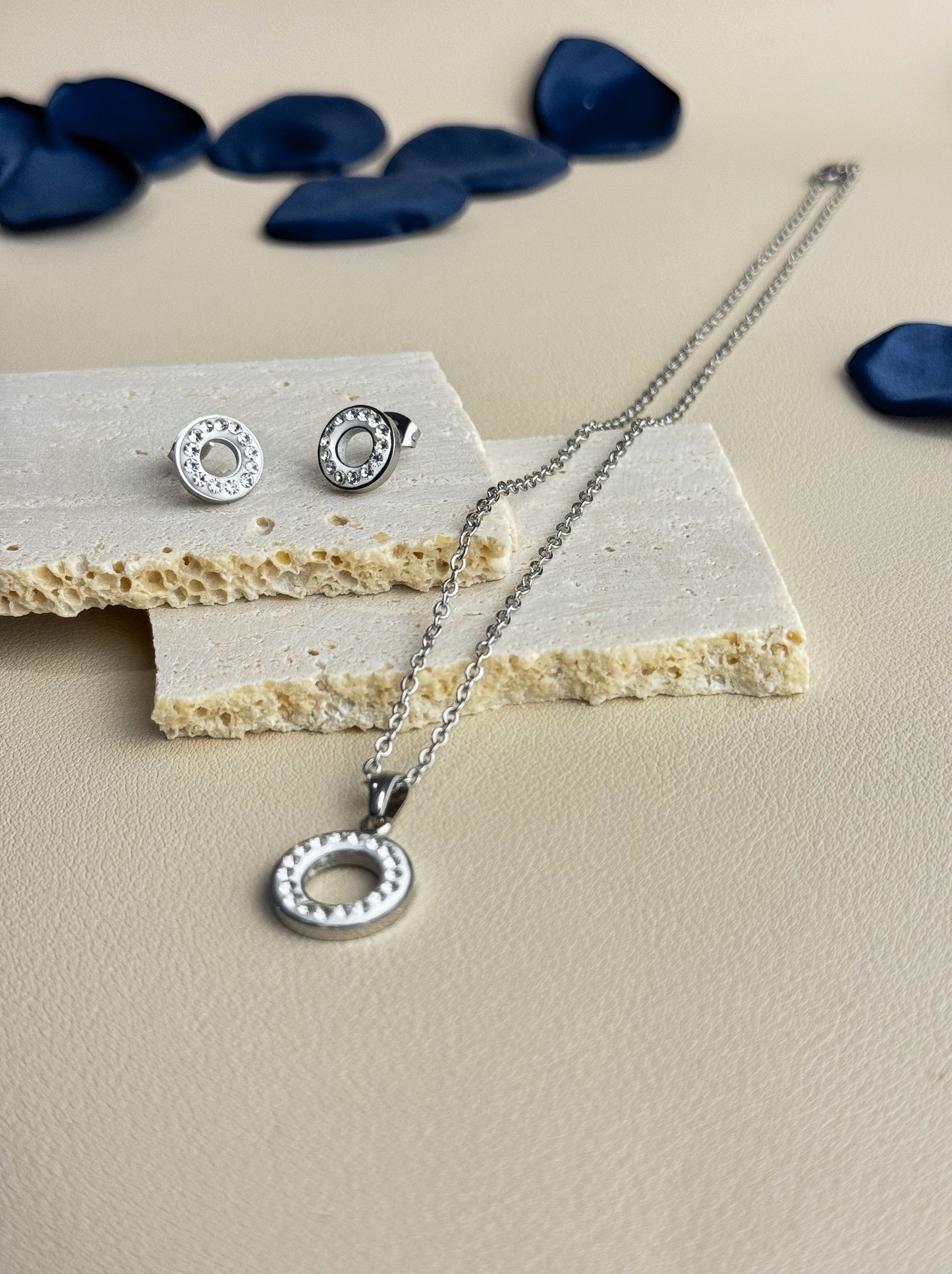 Silver steel necklace with circle of crystals