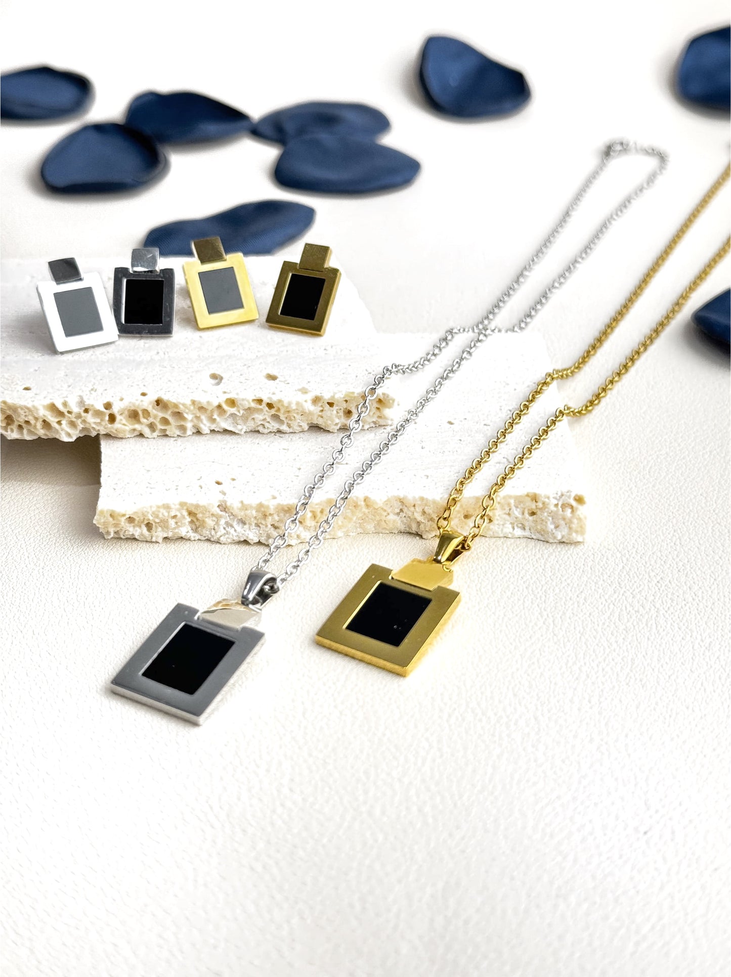 Golden steel necklace with black square