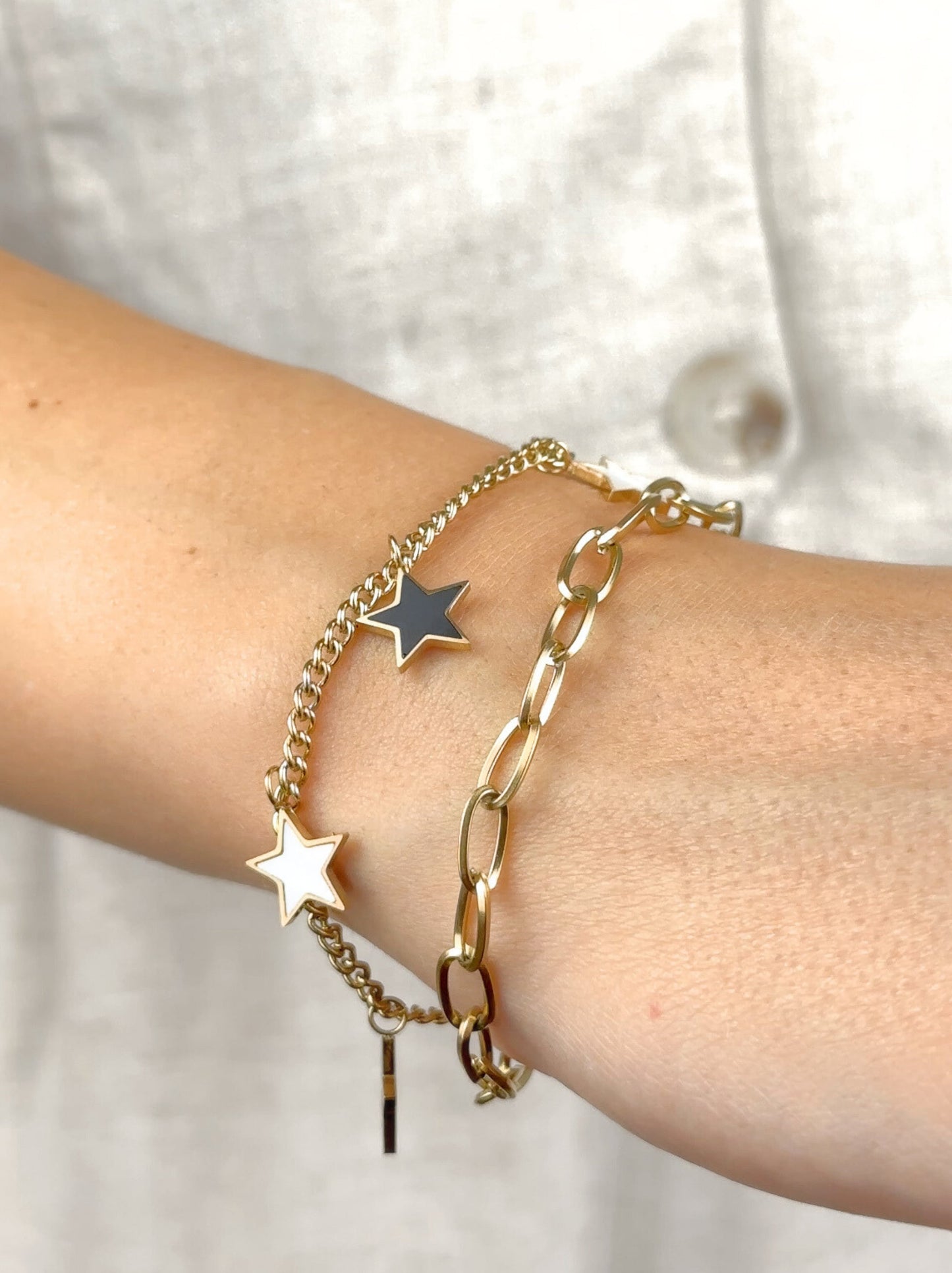 Pulseira de aço dourada estrela