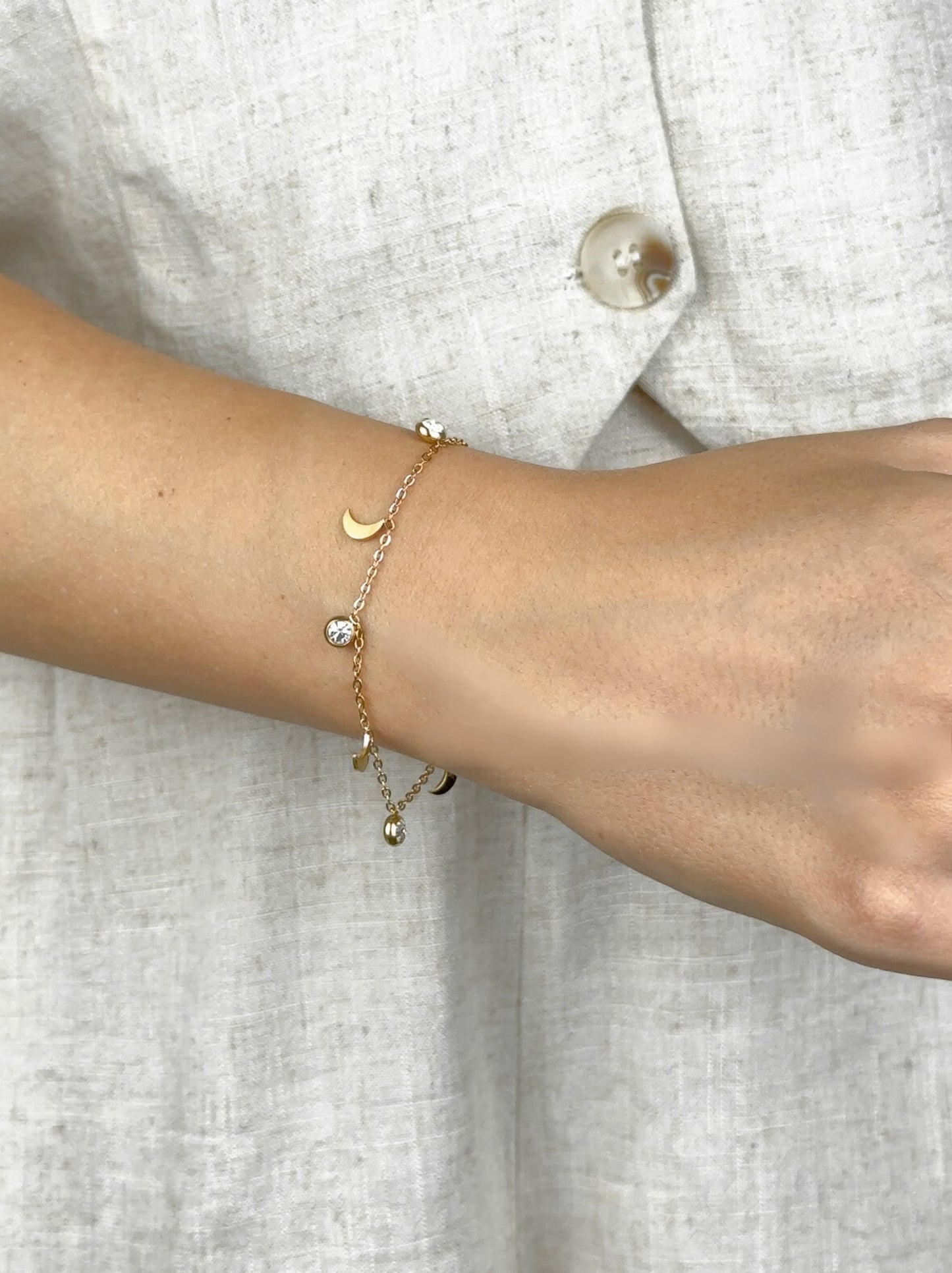 Moon and zirconia gold steel bracelet