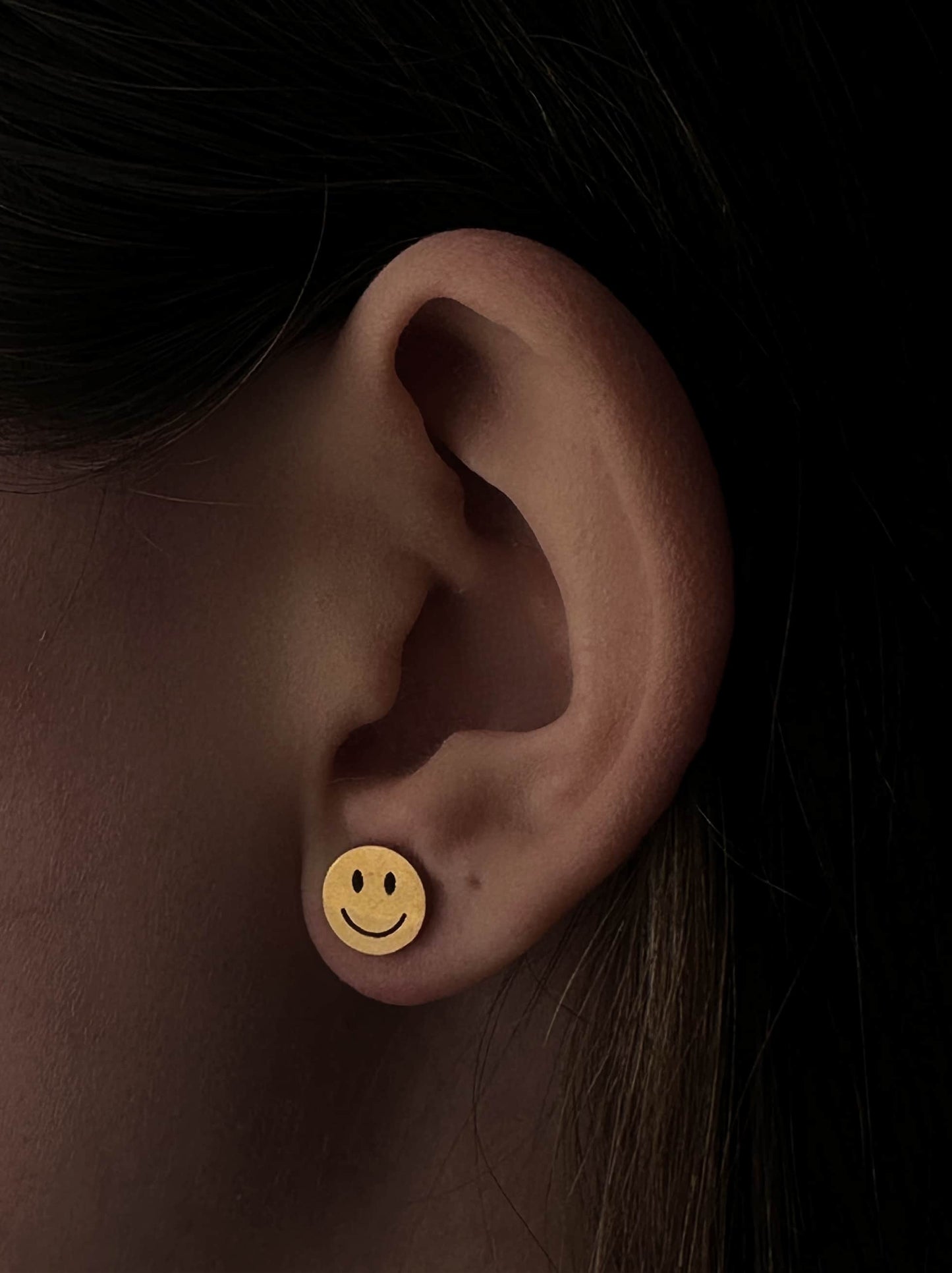 smile gold steel earrings