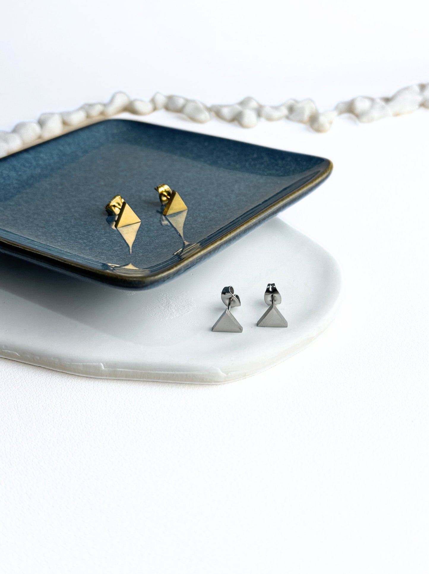 Triangle gold steel earrings