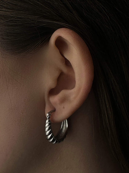 Twisted silver steel hoops