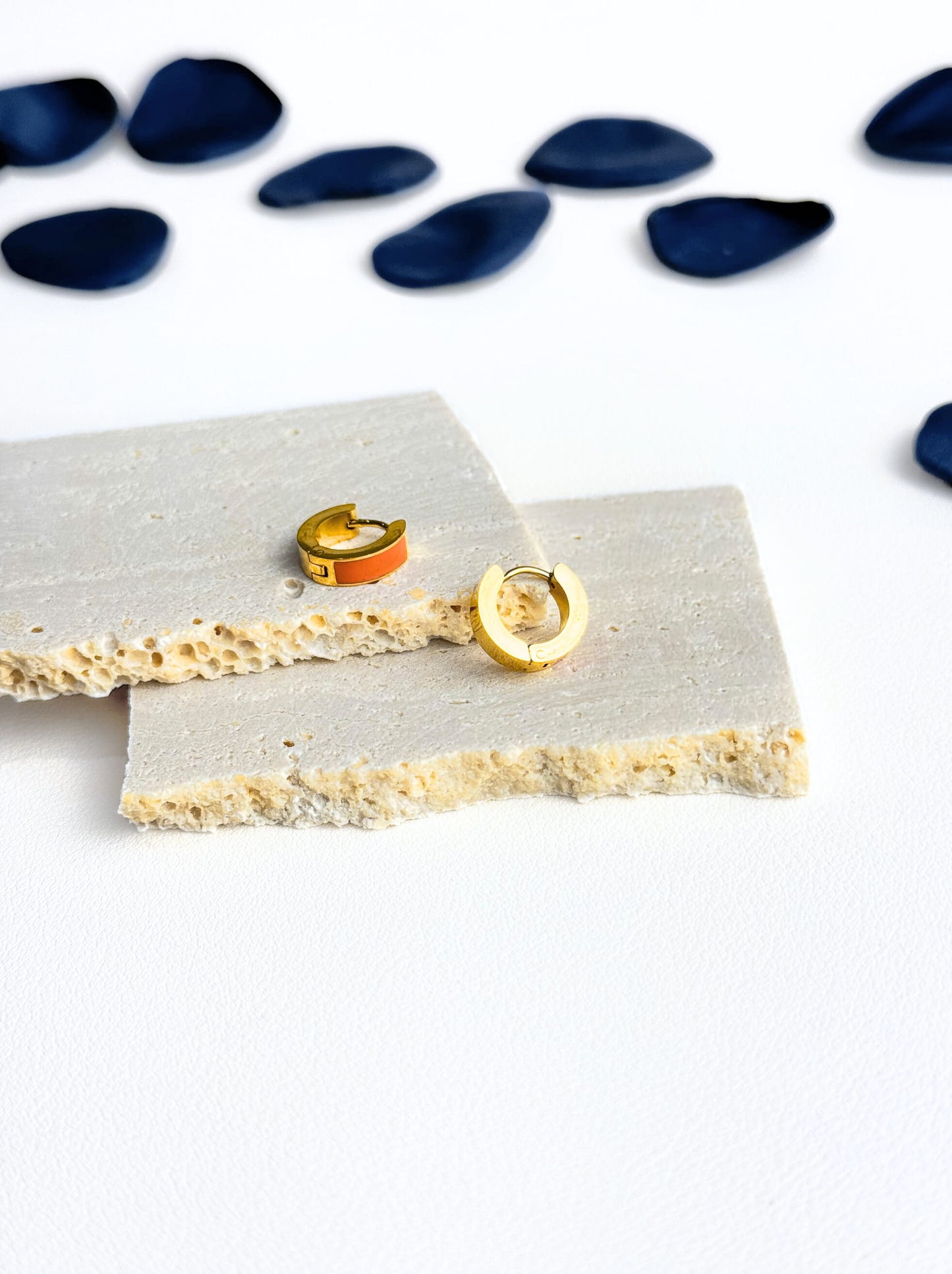 Orange enameled gold steel rings