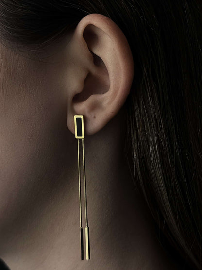 Gold and black steel earrings