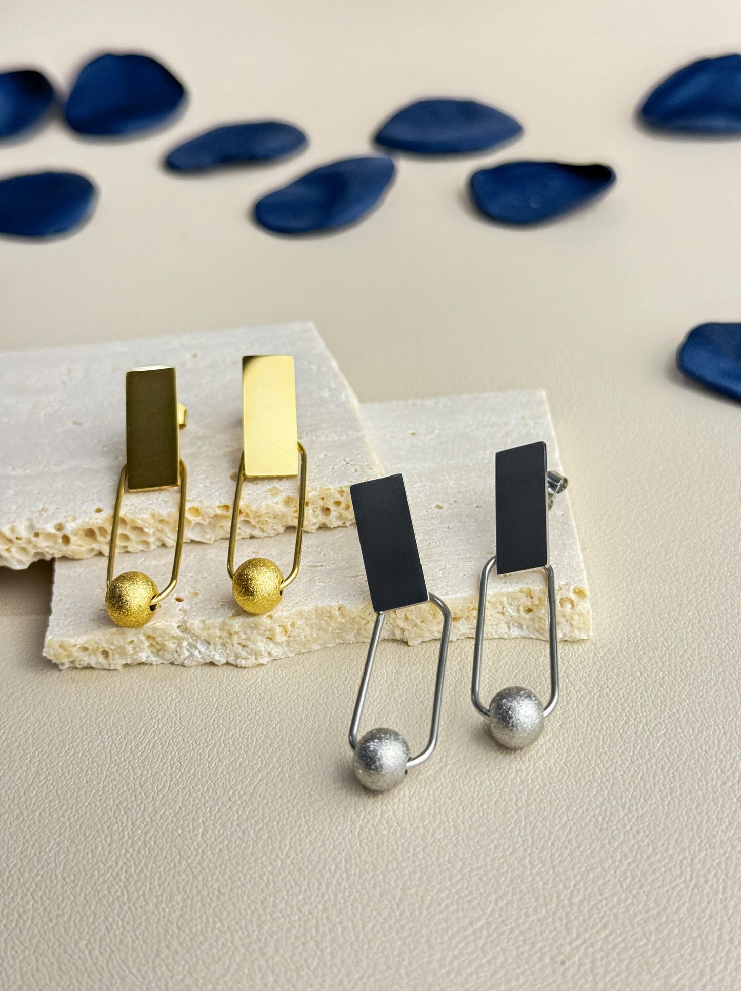 Golden steel earrings