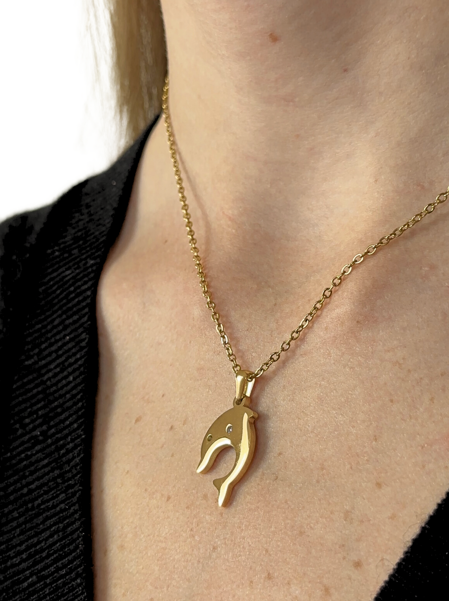 Golden steel necklace with dolphin and crystal