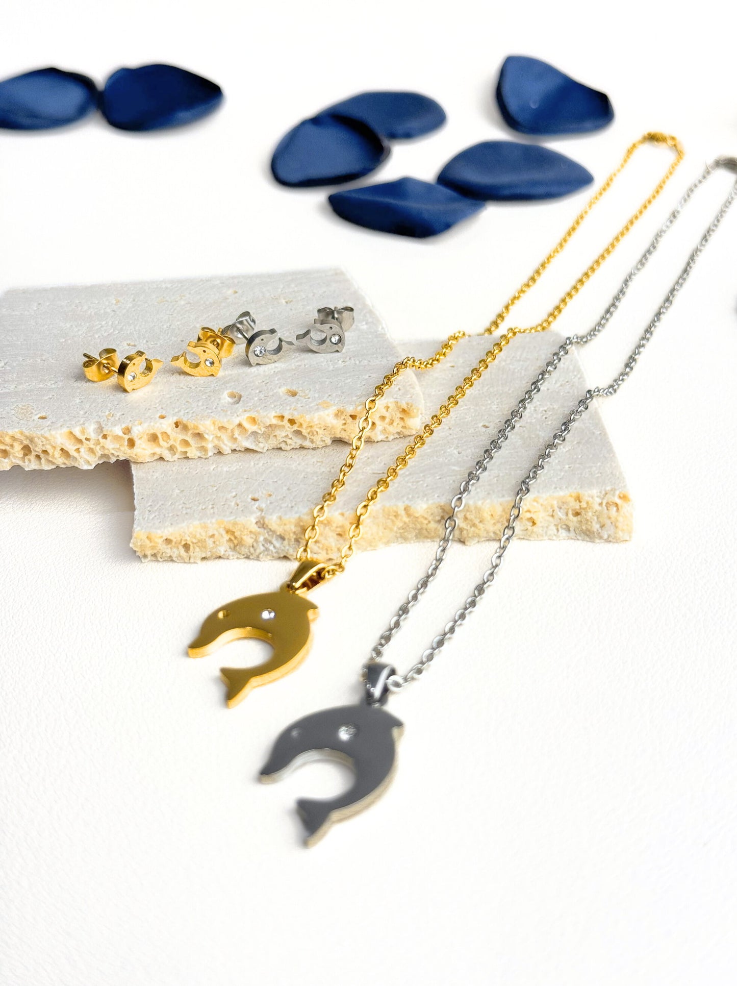 Golden steel necklace with dolphin and crystal