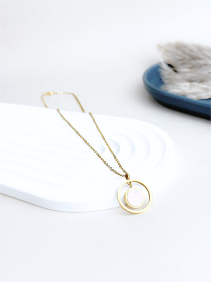 Golden steel necklace with pearl circle