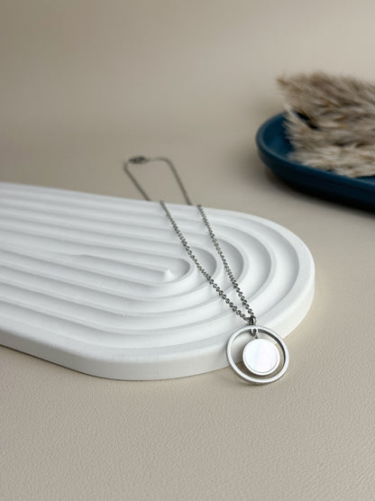 Silver steel necklace with pearl circle