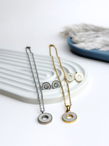 Golden steel earrings with pearl circle