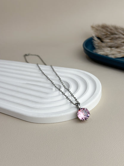 Silver steel necklace with pink crystal