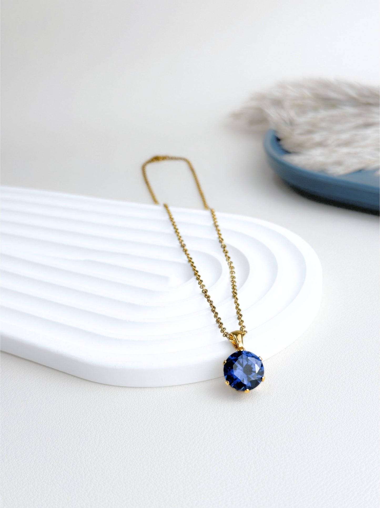 Blue crystal gold steel necklace