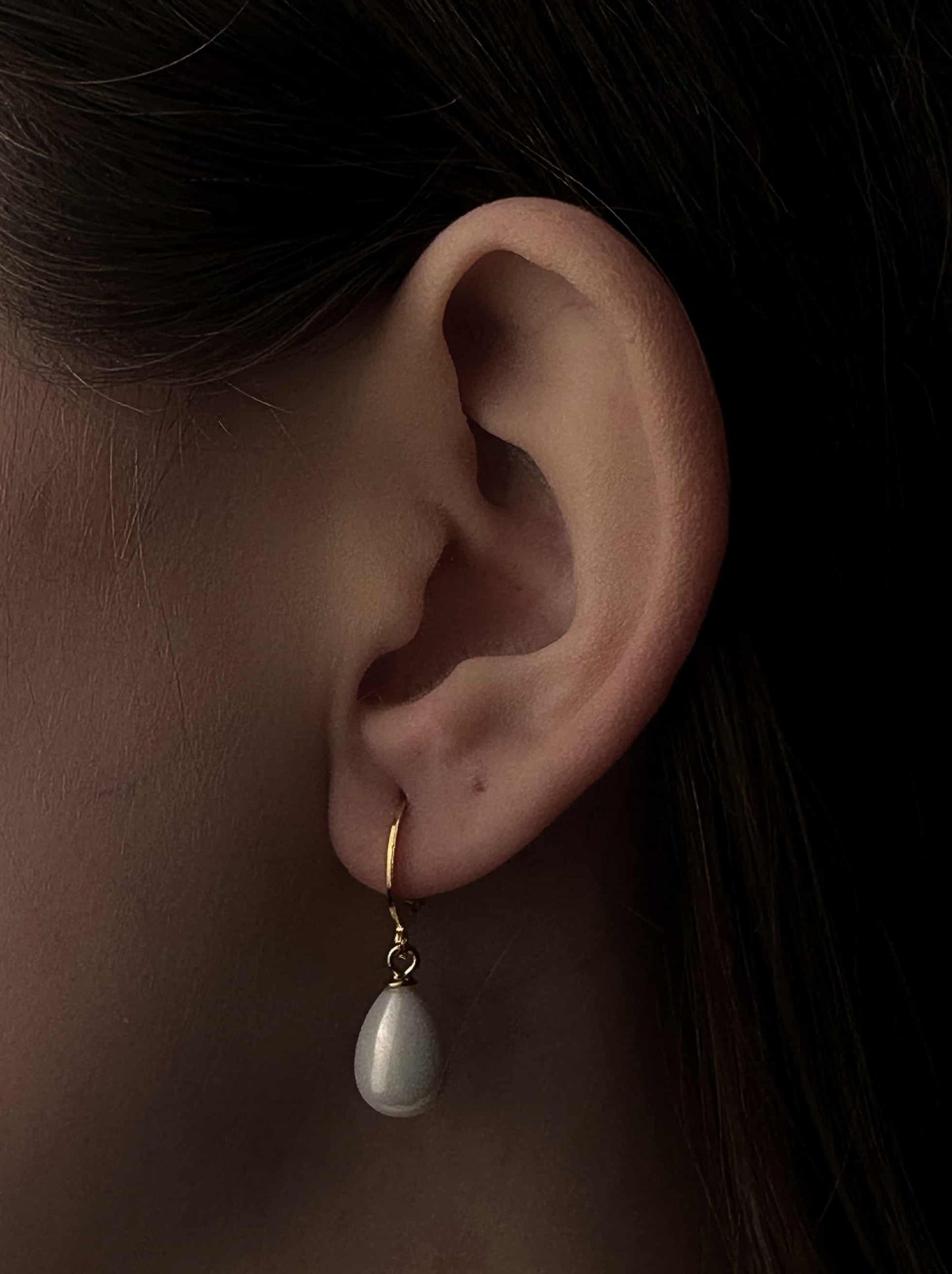 Boucles d'oreilles en acier doré avec perle