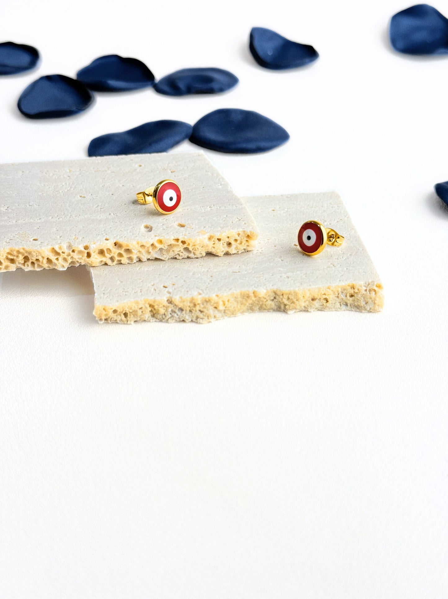 Red eye gold steel earrings