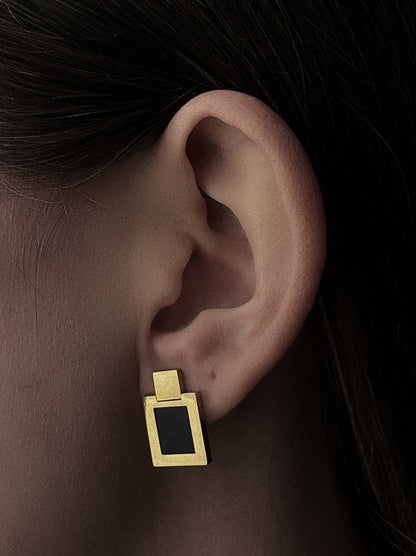 Golden steel earrings with black square