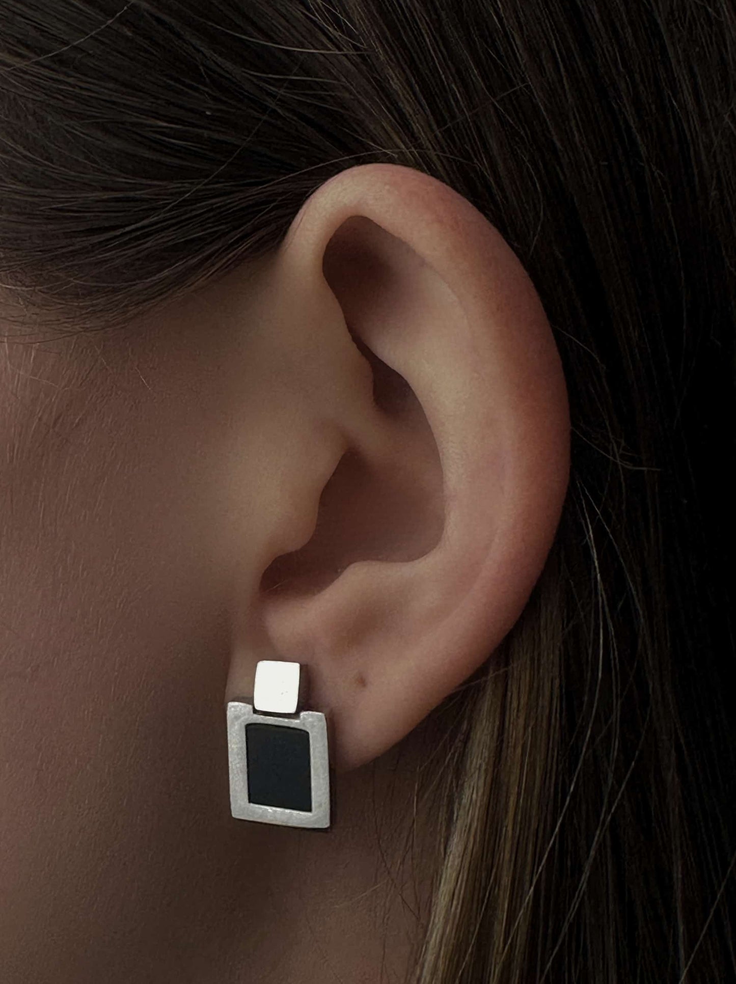 Silver steel earrings with black square