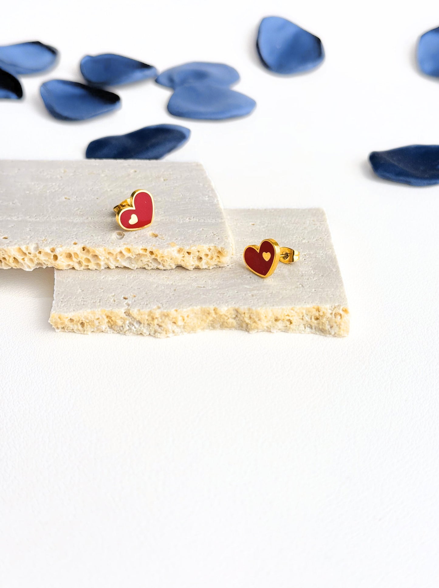 Golden steel earrings with red heart