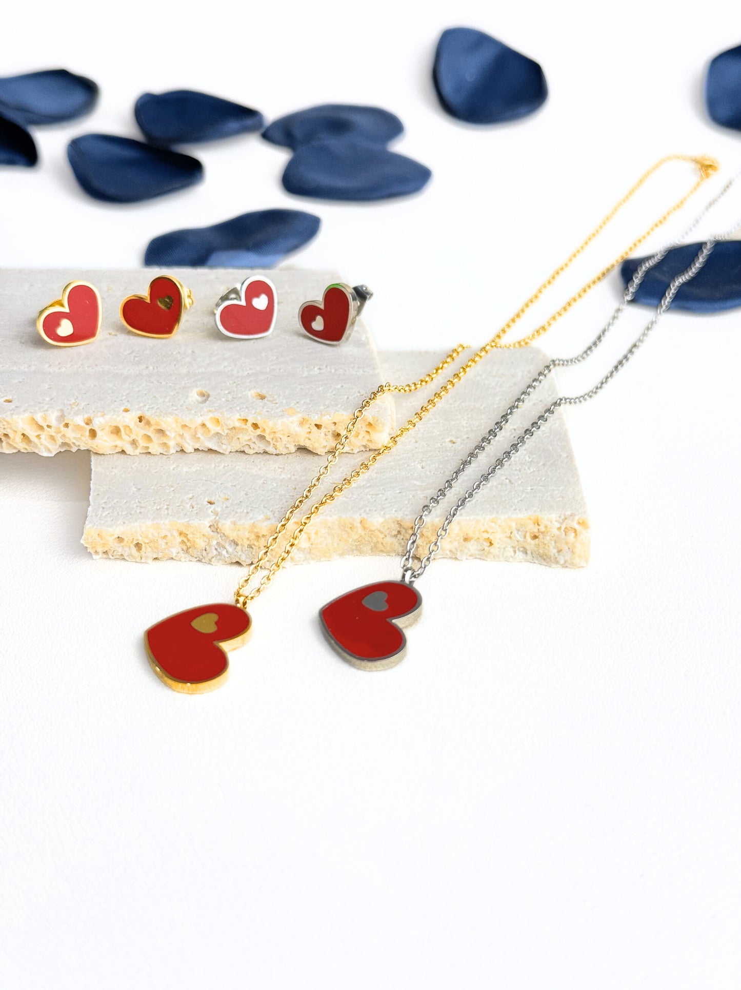 Golden steel earrings with red heart