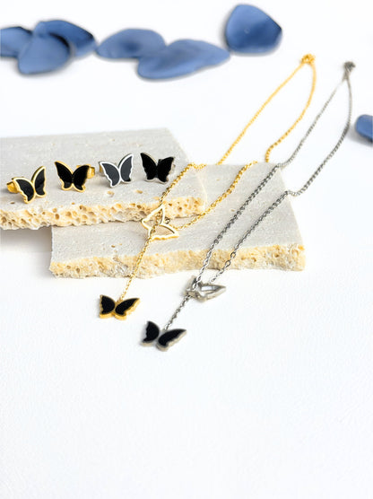 Golden steel earrings with black butterfly