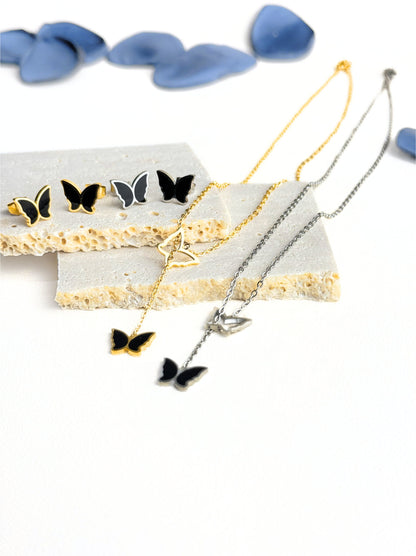 Collier en acier doré avec papillon noir