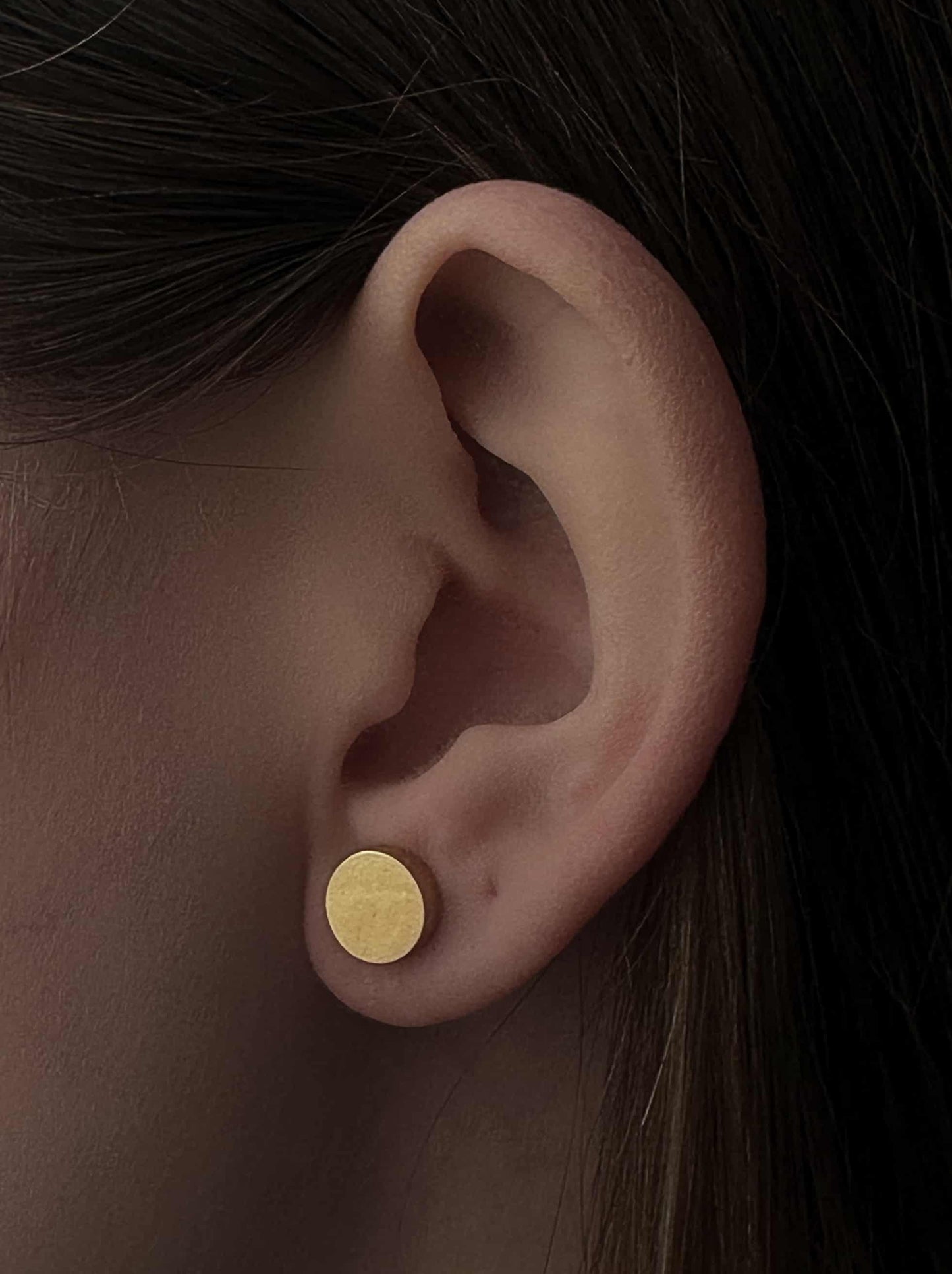 Golden steel earrings with smooth medals