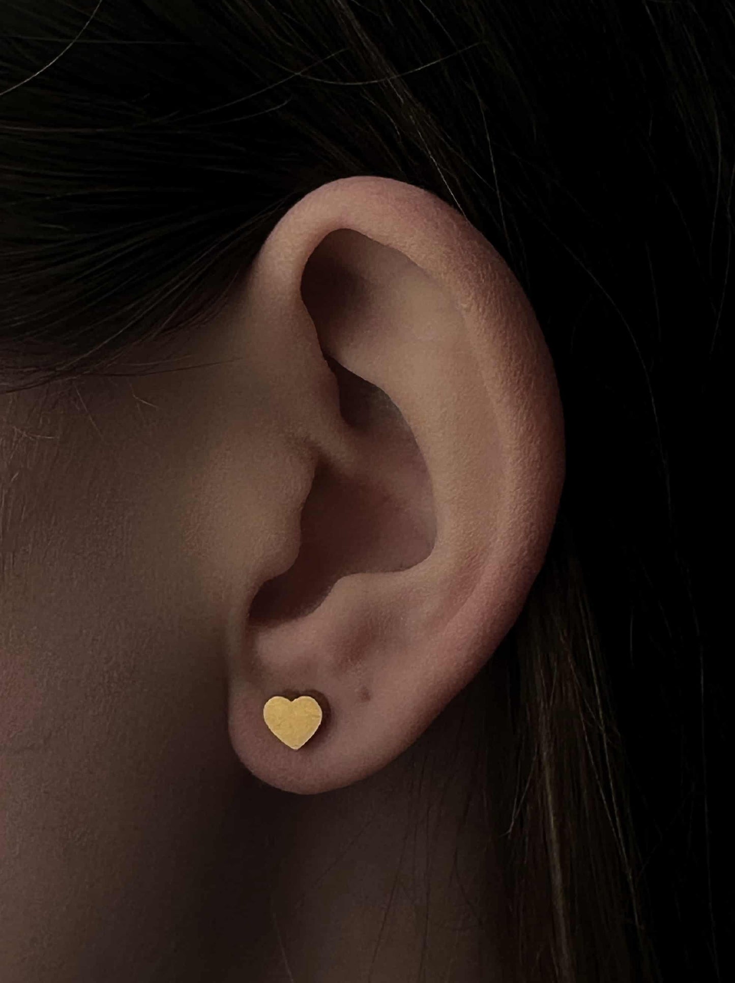 Golden steel earrings with smooth heart