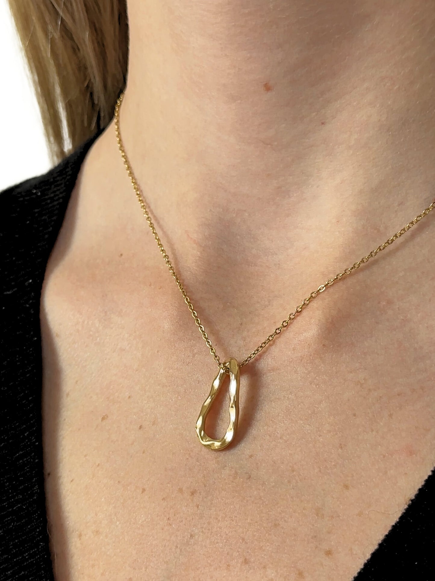 Golden steel necklace with irregular pendant