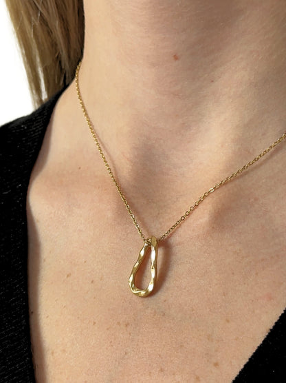 Golden steel necklace with irregular pendant