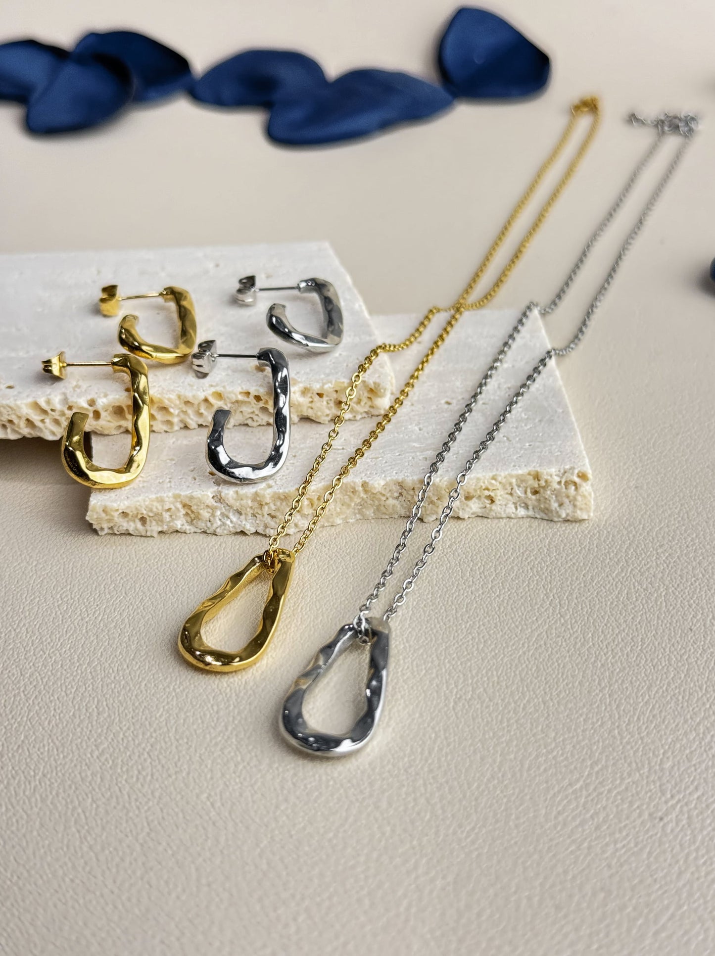 Golden steel necklace with irregular pendant