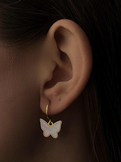 Golden steel earrings with pearl butterfly