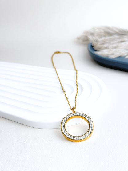 Golden steel necklace with circle of crystals