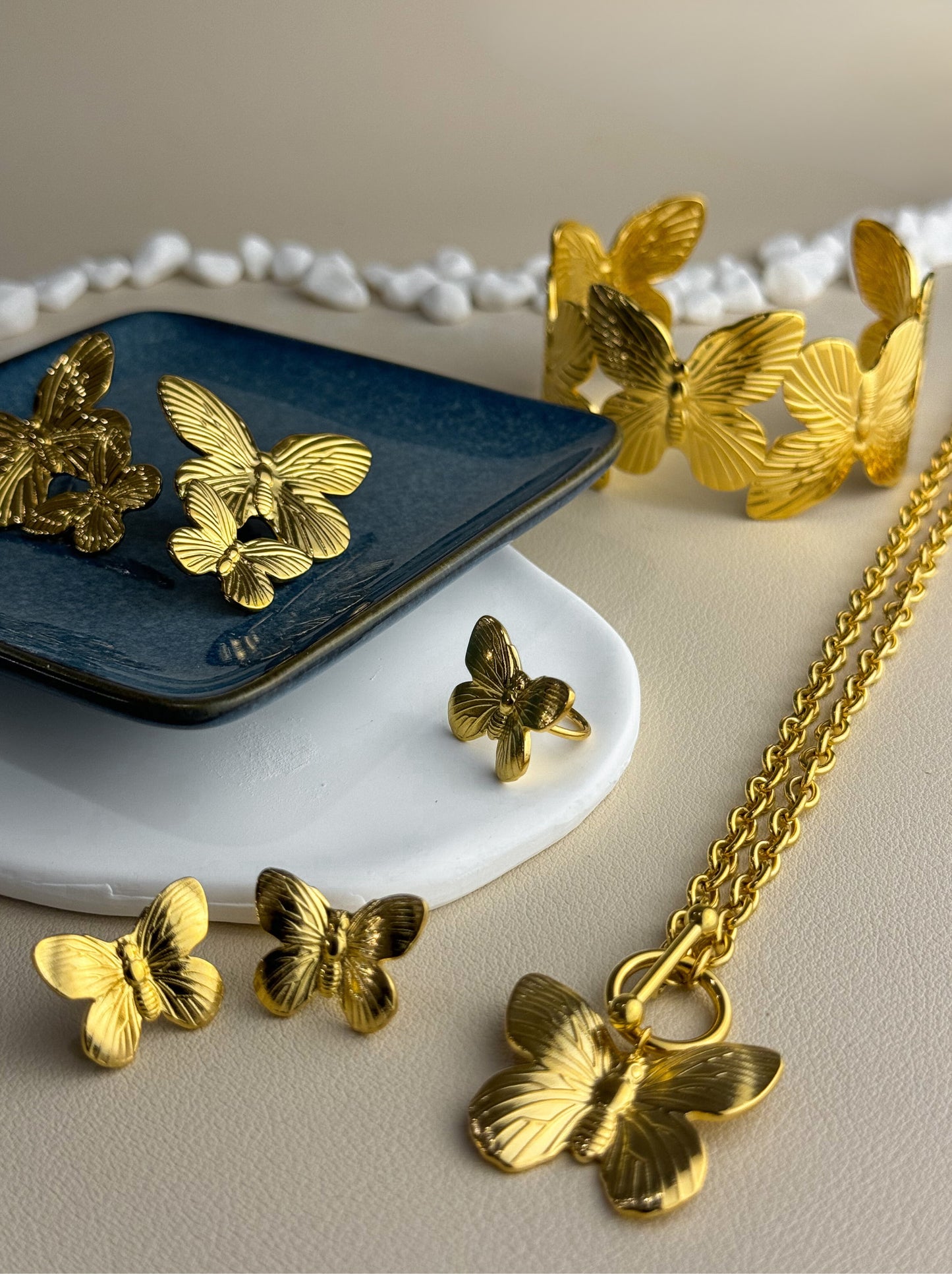 Butterfly gold steel earrings