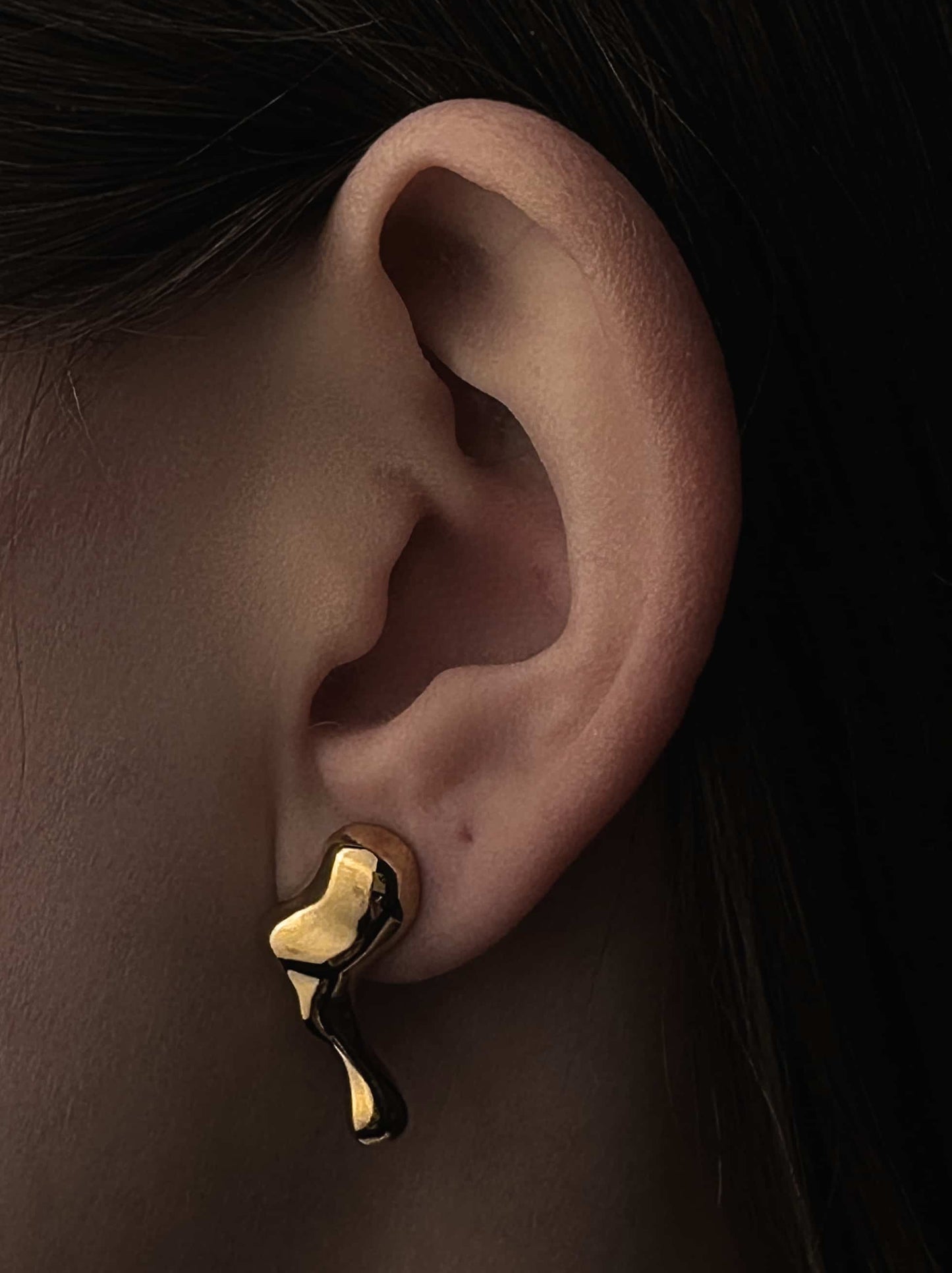 Melted gold steel earrings