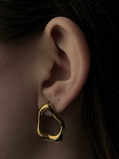 Golden steel earrings