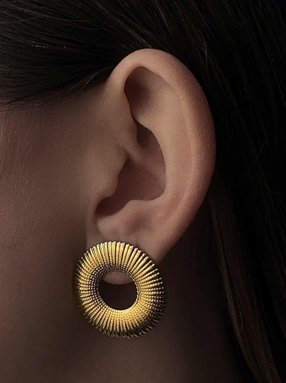 Circle golden steel earrings