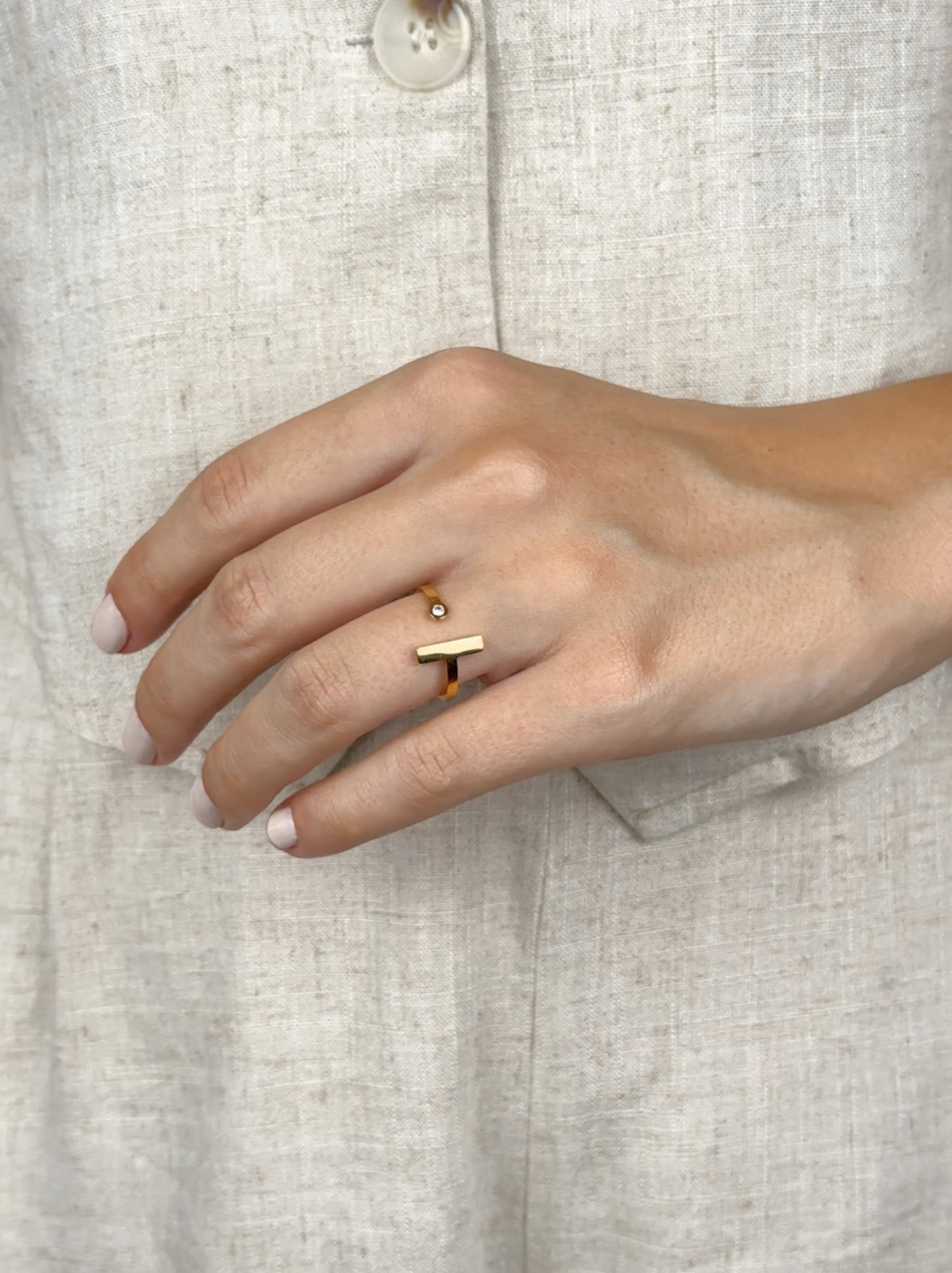 Adjustable gold steel ring with zirconia