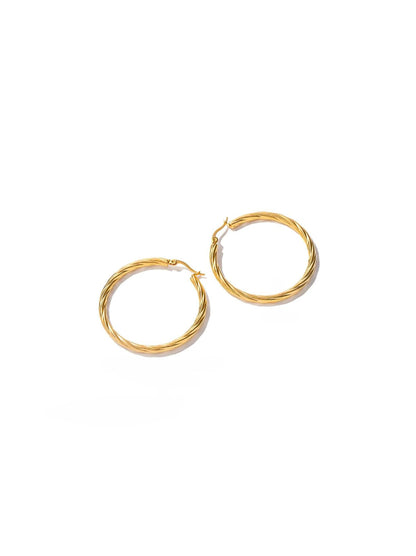 Twisted golden steel hoops