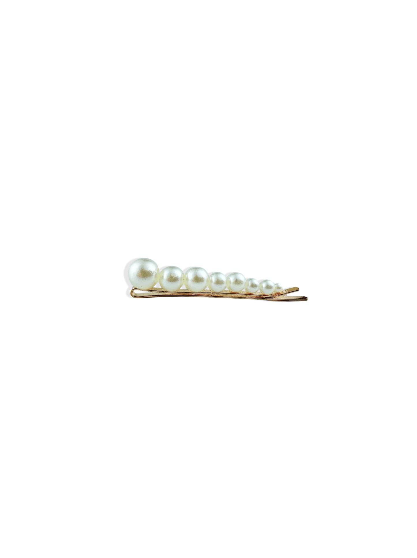 Golden hair clip with pearls