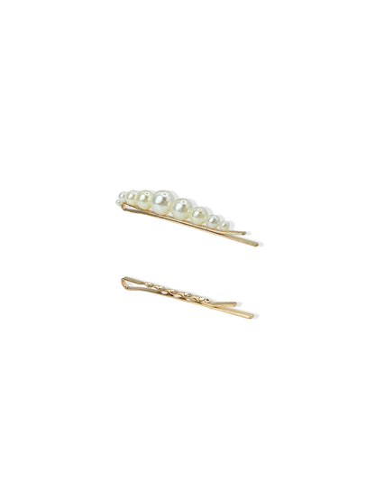 Golden hair clip with pearls