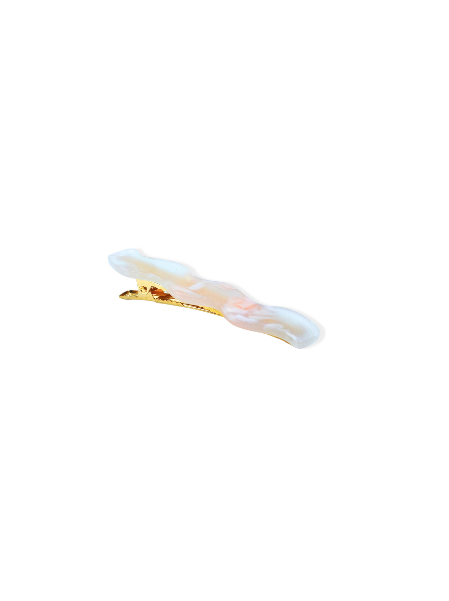 Golden hair clip with orange resin