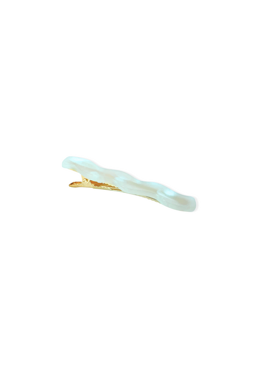 Golden hair clip with white resin