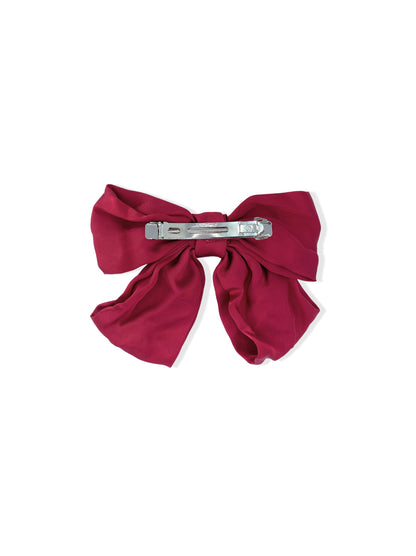 French hair clip with red bow