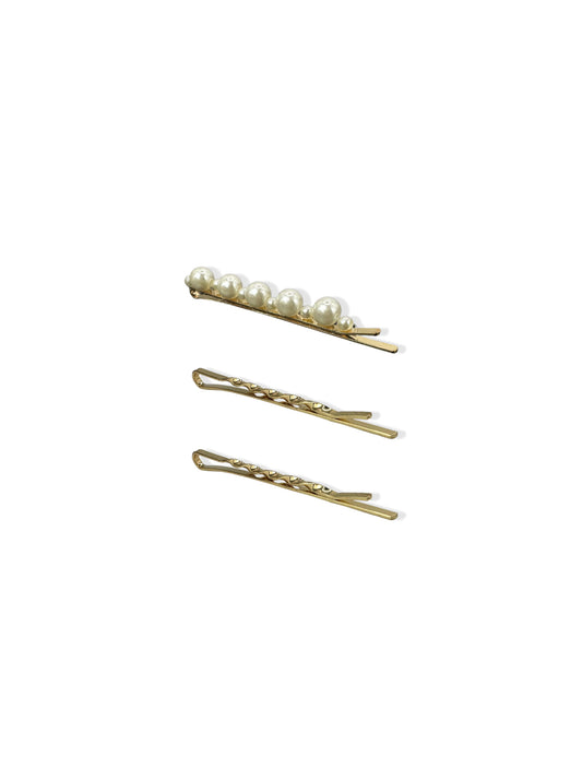 Set of golden hair clips