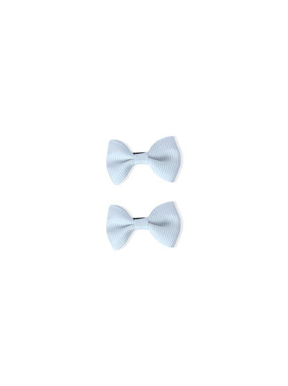 Hair clip with white bow